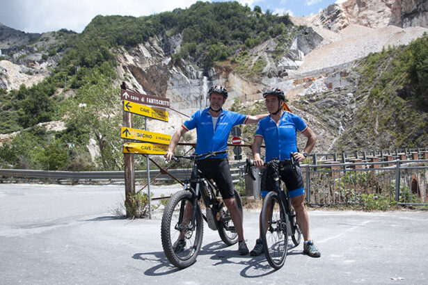 bikers in front of the marble quarries
