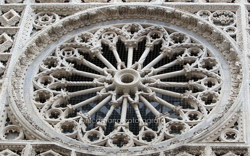 marble rose window of the duomo in carrara