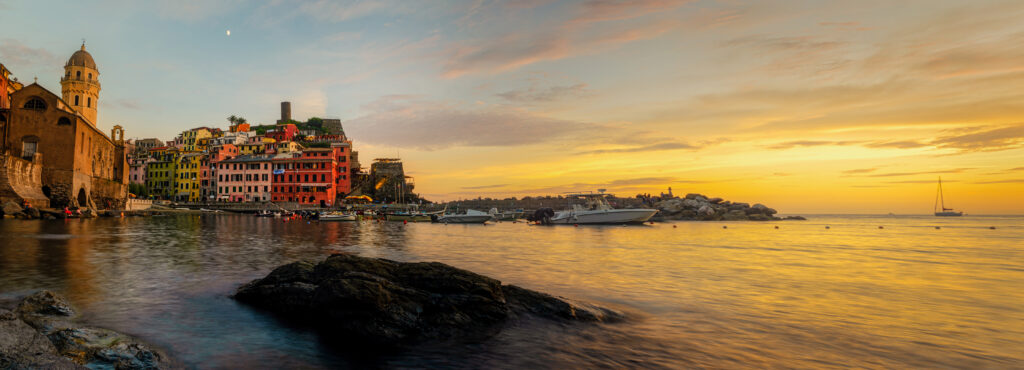 the marina of vernazza in the sunset