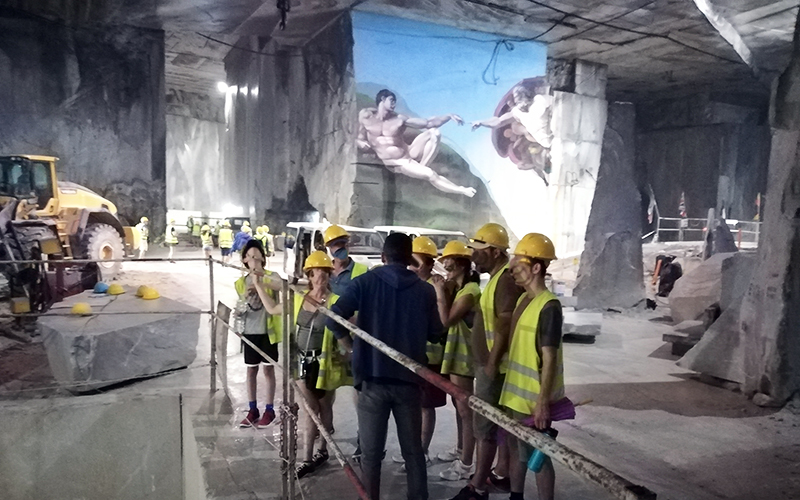 group of people visiting the underground quarry