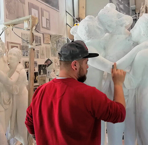 Sculptor at work on a marble statue