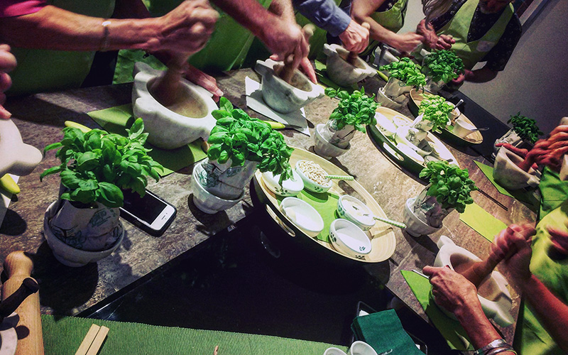 ponding the pesto in the marble mortar