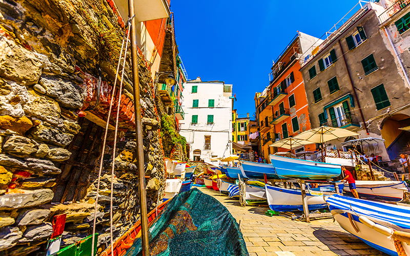 5 terre, riomaggiore, solorful boats stored in the marina